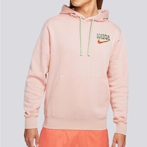 Nike Sportswear Fantasy Creature Men's Pullover Hoodie in Pink Oxford.